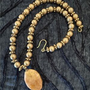 Gold Beaded Necklace with Oval Pendant